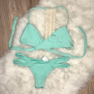 Never worn bikini. ea brand